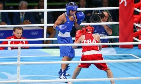 
Фото боксерского поединка Олимпиады-2016 Шекербекова — Урамун