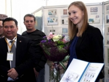 В Алматы Ольга Рыпакова приняла участие в гашении марок с изображением Олимпийских чемпионов