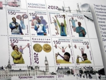 В Алматы Ольга Рыпакова приняла участие в гашении марок с изображением Олимпийских чемпионов