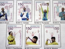 В Алматы Ольга Рыпакова приняла участие в гашении марок с изображением Олимпийских чемпионов