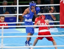 Фото боксерского поединка Олимпиады-2016 Шекербекова — Урамун