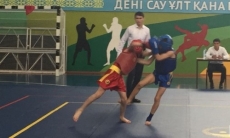 Около трехсот спортсменов вступили в борьбу в чемпионате Казахстана по ушу саньда