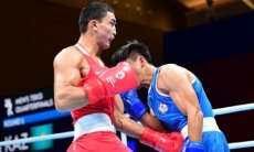 Первый казахстанский боксер вышел в финал Азиады-2018