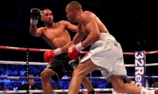 Убежавший от Головкина боксер борцовским приемом швырнул на канвас соперника и выиграл титул