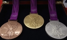 МОК требует у казахстанских спортсменов вернуть олимпийские награды
